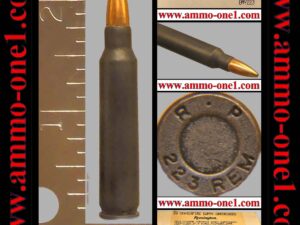 (a021) .223 remington factory dummy by remington, "r·p 223 rem" h/s, dark brown powder coat finish case, 55 gr. fmj, one cartridge not a box.